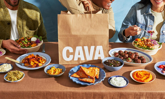 cava food take away bag with plates on the table